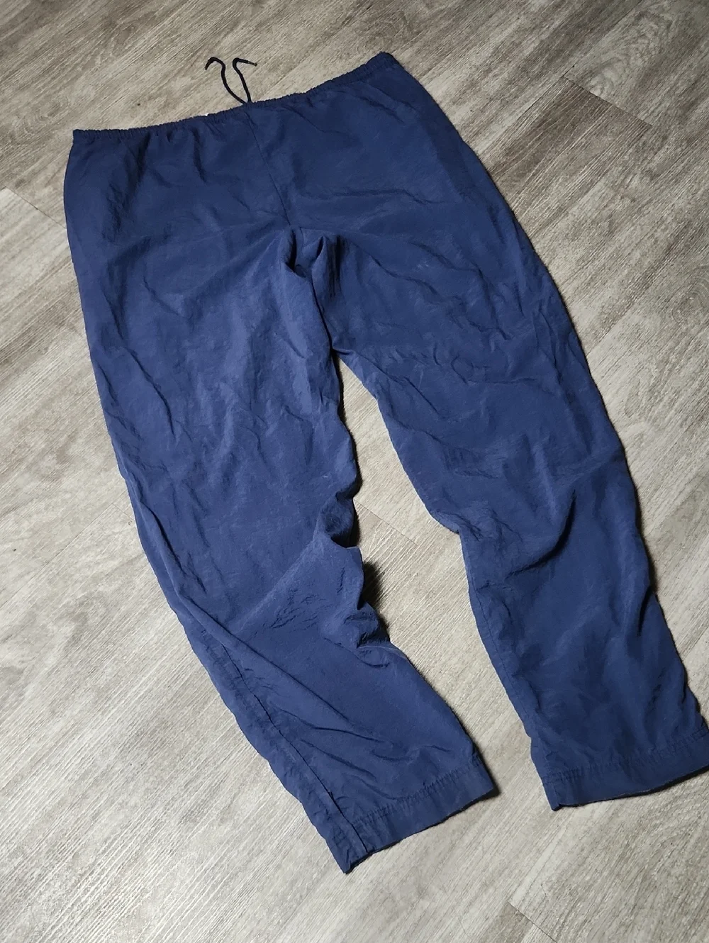 Vintage Nike Navy Blue Track Pants with Red Swoosh